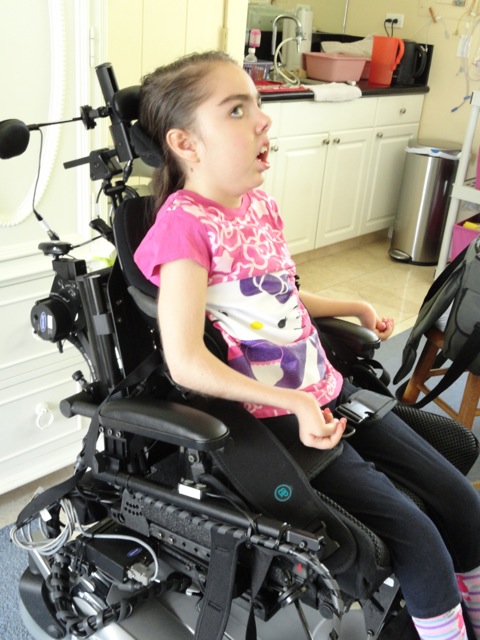 In her power chair, 2011