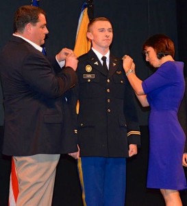 pinning on Whispering one last special prayer, I put the hard-earned gold bars on Chase's uniform.